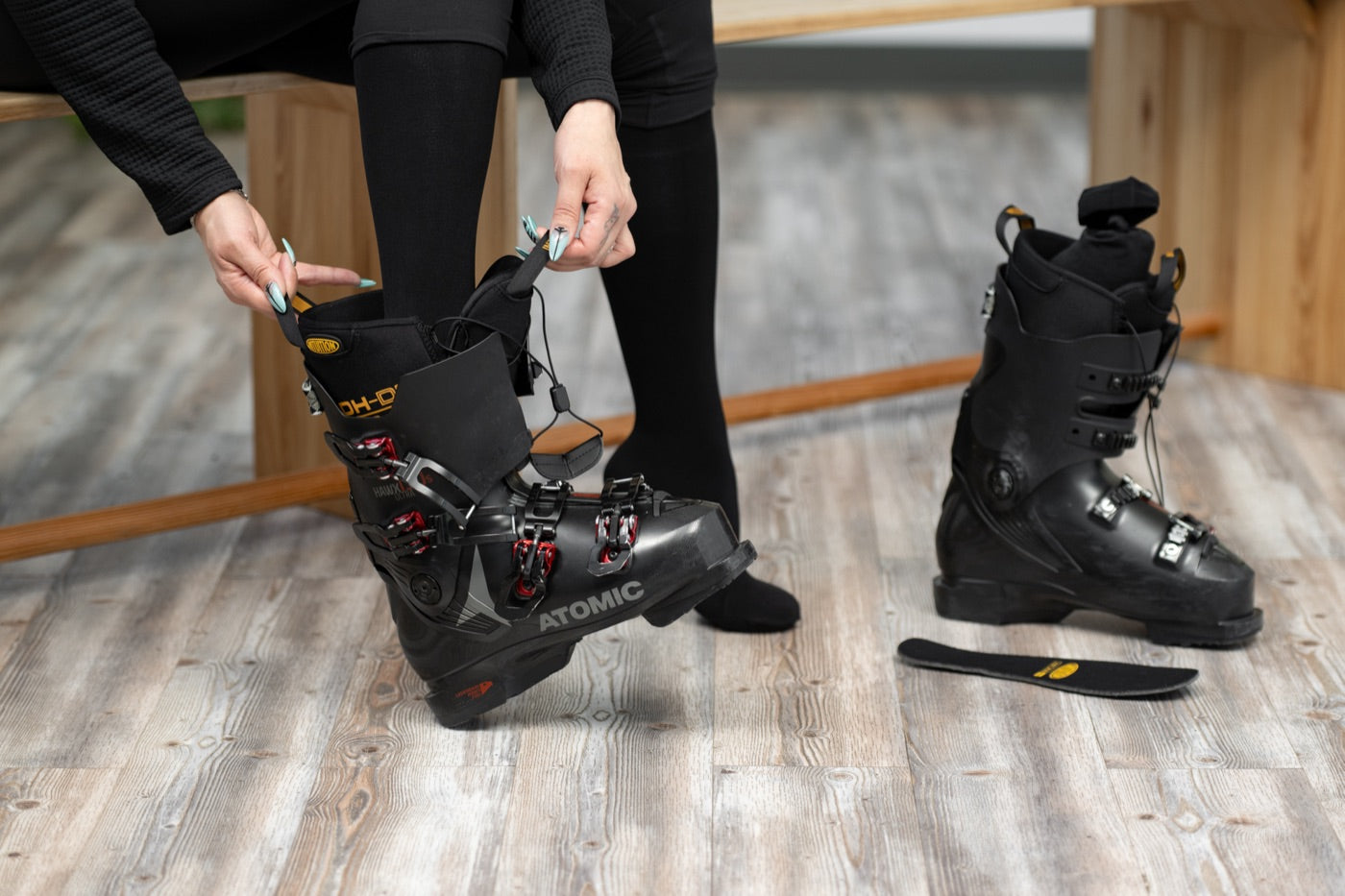 Stepping into the heated liner in the boot