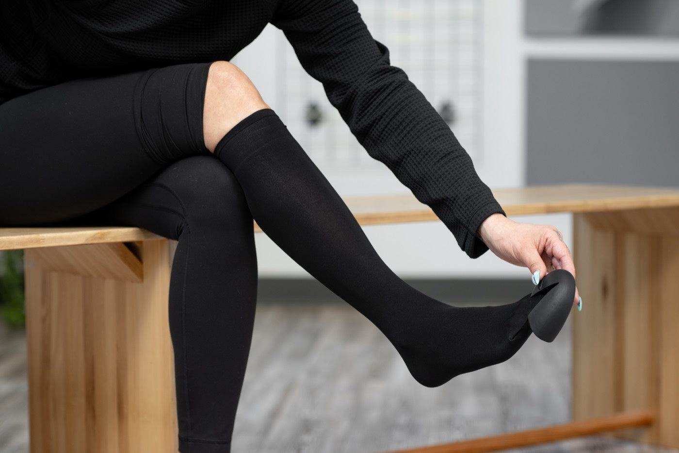 Fitting the toe cap and pulling the fit stocking over it