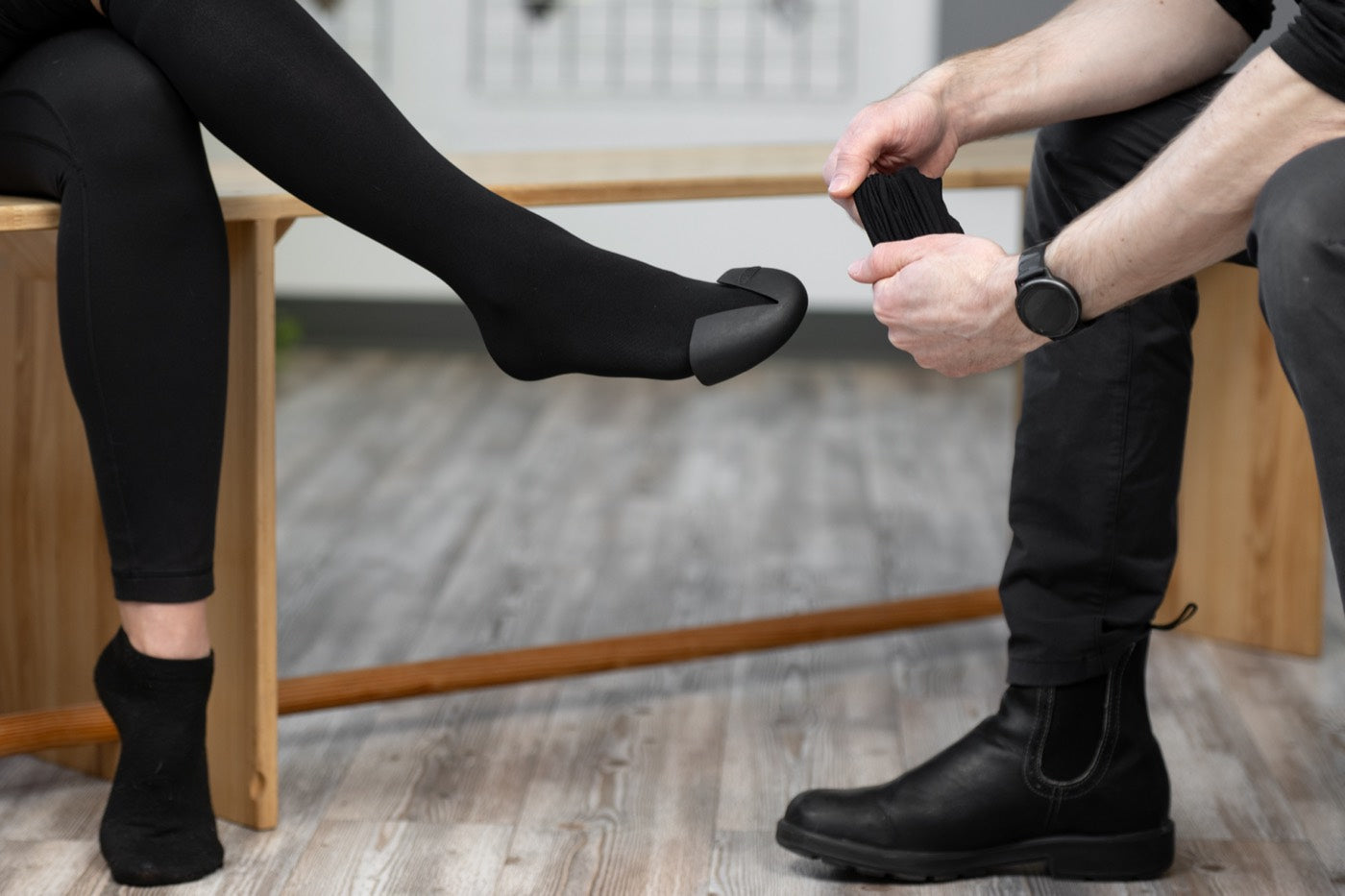 Fitting the toe cap and pulling the fit stocking over it
