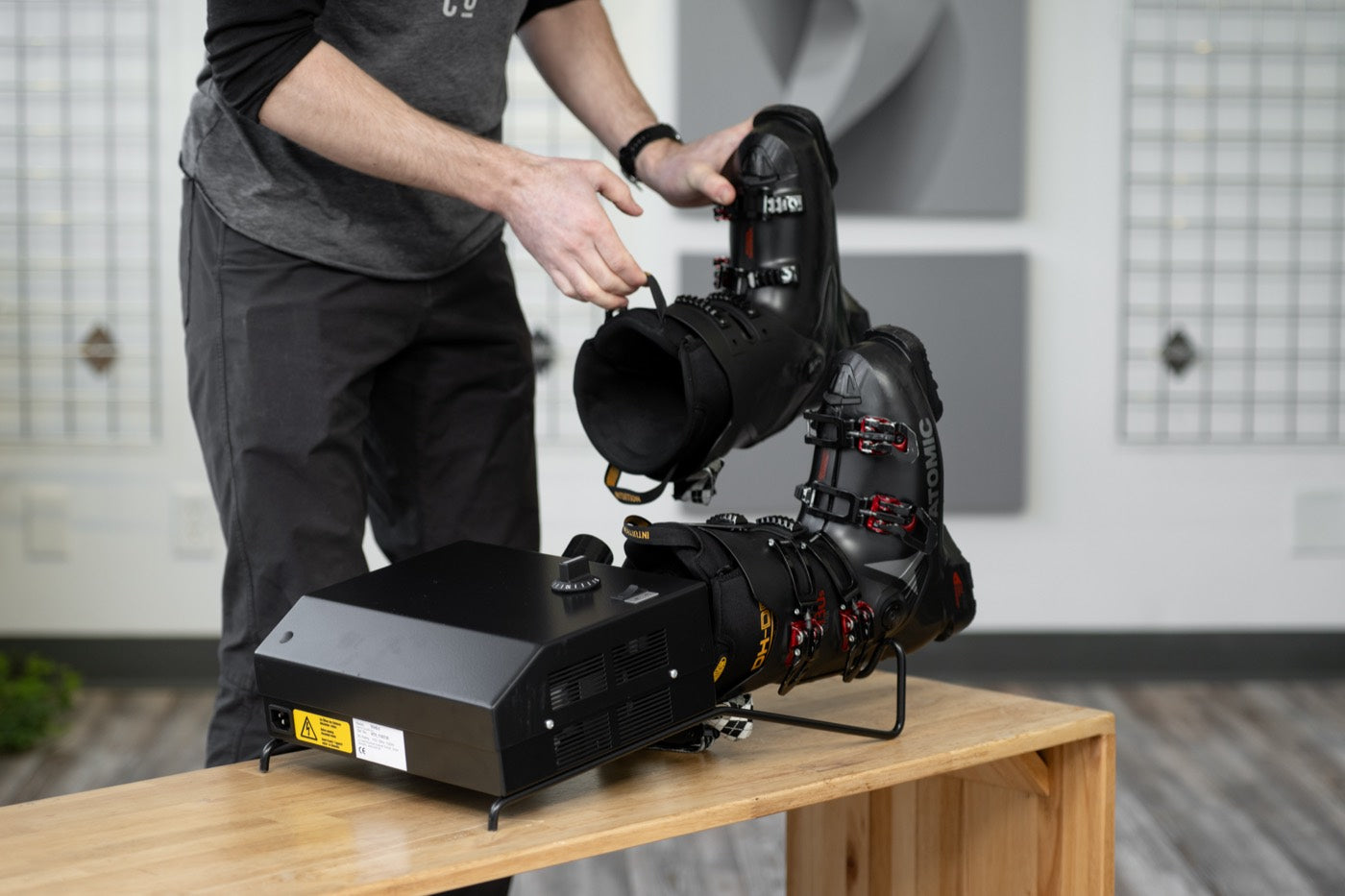 Boots with liners inside heating on the heat tube machine